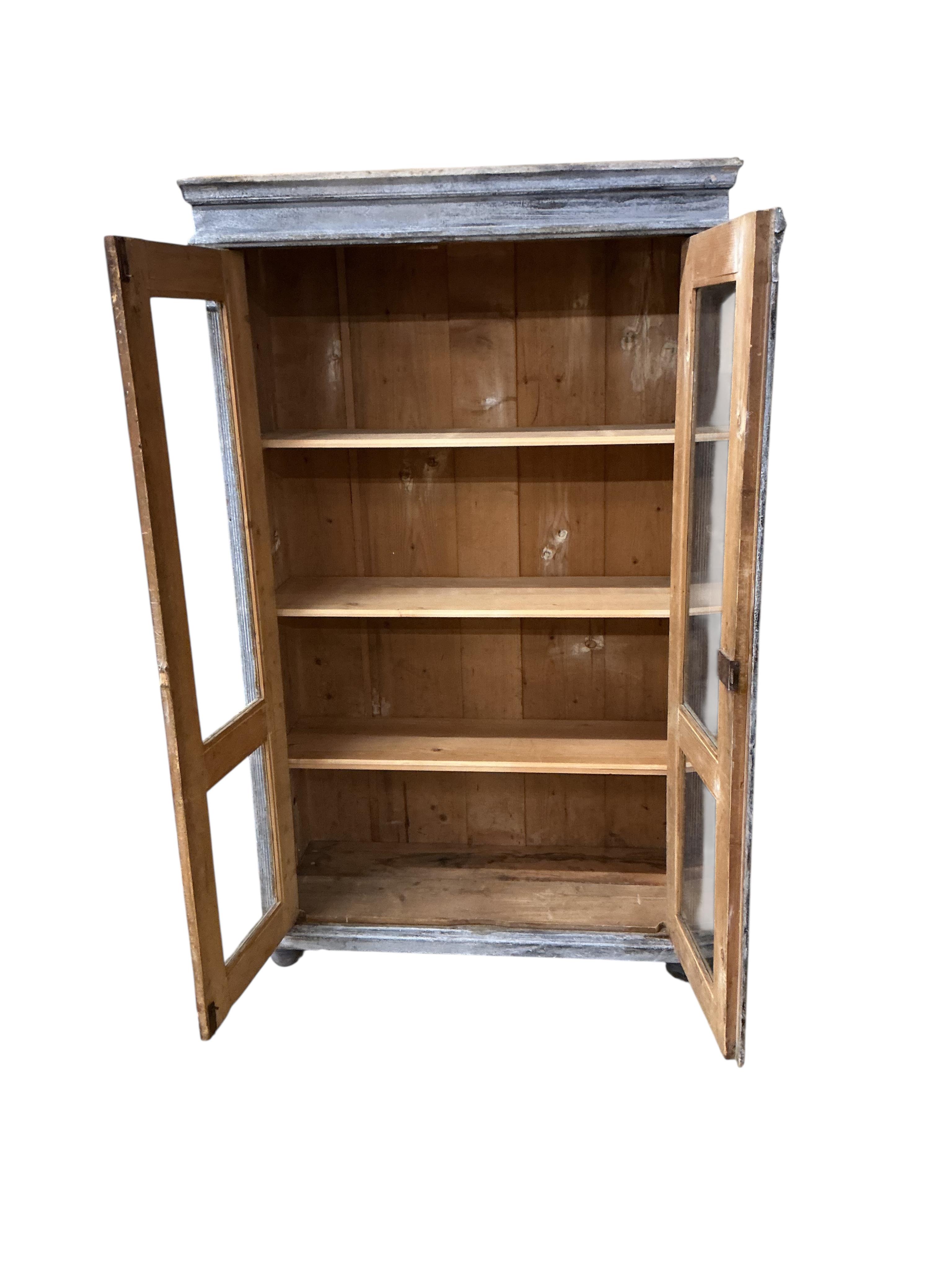 A 19th century East European painted pine cabinet, width 108cm, depth 46cm, height 178cm